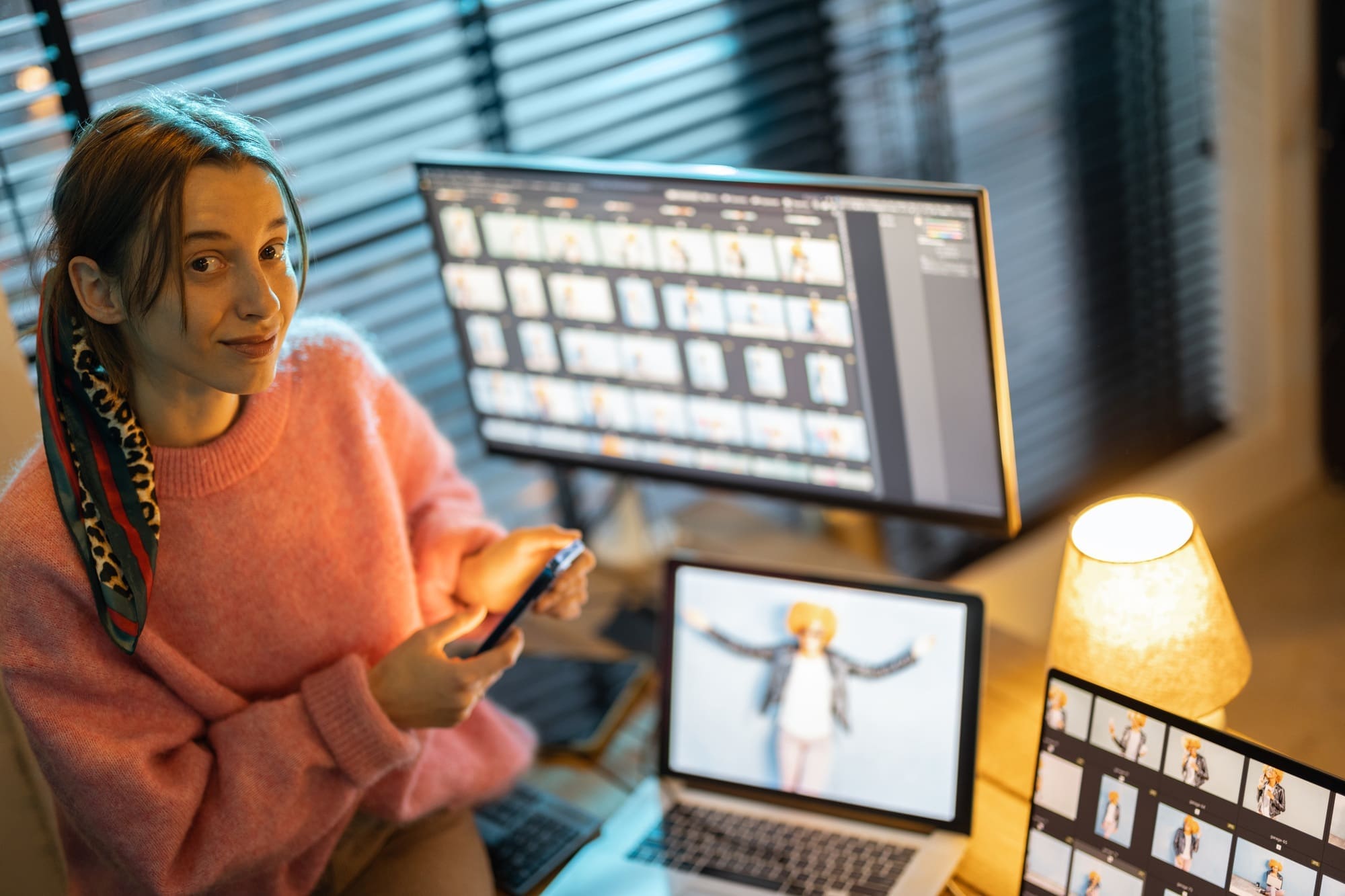 Photographer editing photos at home office